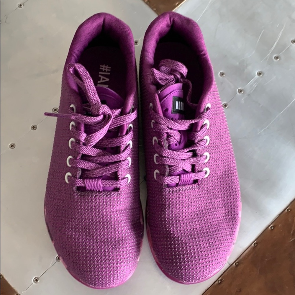 NoBull purple weight lifting tennis shoes.